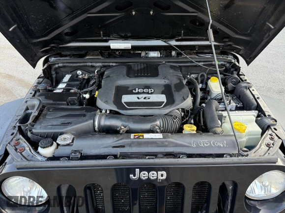 2015 Jeep Wrangler Unlimited Sport with VIN 1C4BJWDG8FL502570, listed as a Copart auction lot 65854505 with 120,541 mi miles and Clean title. Bid and sale history available at DreamBid. Image 7.