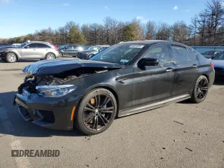 2018 BMW M5 z VIN WBSJF0C59JB283734, wystawiony jako Copart lot #44834585 z przebiegiem 46 611 mil mil oraz Szkoda całkowita • Salvage title. Historia ofert i sprzedaży dostępna na DreamBid. Obrazek 1.