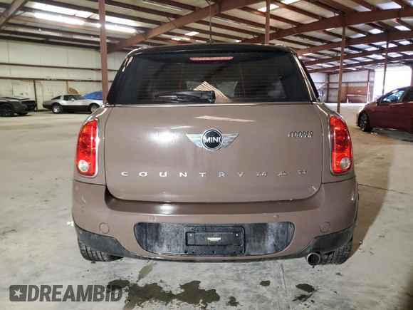 2015 MINI Countryman with VIN WMWZB3C52FWR44105, listed as a Copart auction lot 86780484 with Not Provided miles and Salvage Title. Bid and sale history available at DreamBid. Image 6.