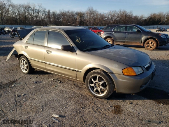2000 Mazda Protege DX with VIN JM1BJ2222Y0238301, listed as a Copart auction lot 85283554 with 326,226 mi miles and Non Repairable. Bid and sale history available at carsss.com. Image 4.