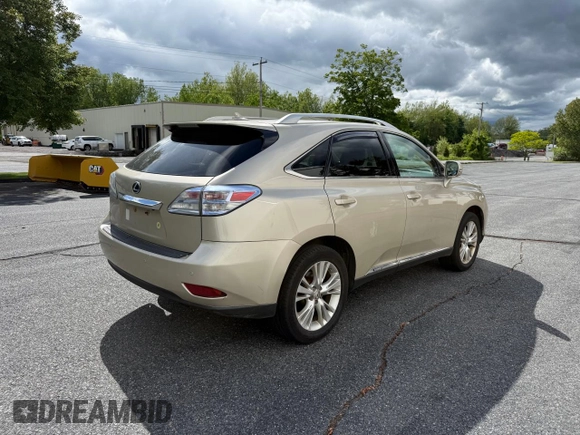 2012 Lexus RX 450h z VIN JTJBC1BA5C2427885, wystawiony jako Copart lot #58626695 z przebiegiem 166 056 mil mil oraz Szkoda całkowita • Salvage title. Historia ofert i sprzedaży dostępna na DreamBid. Obrazek 4.