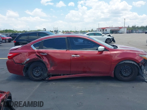 2016 Nissan Altima S z VIN 1N4AL3AP4GN353532, wystawiony jako IAAI lot #42325237 z przebiegiem 165 624 mil mil oraz . Historia ofert i sprzedaży dostępna na DreamBid. Obrazek 14.