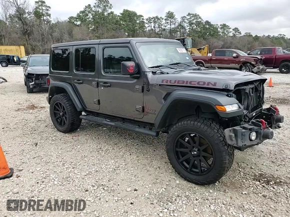2018 Jeep Wrangler Unlimited Rubicon with VIN 1C4HJXFN9JW249214, listed as a Copart auction lot 42692175 with 161,157 mi miles and Salvage title. Bid and sale history available at DreamBid. Image 15.