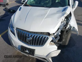 2016 Buick Encore Premium with VIN KL4CJDSB1GB647306, listed as a IAAI auction lot 41983159 with 59,592 mi miles. Bid and sale history available at carsss.com. Image 6.