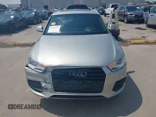 2016 Audi Q3 Premium Plus z VIN WA1EFCFS3GR002758, wystawiony jako IAAI lot #42262429 z przebiegiem 134 850 mil mil oraz . Historia ofert i sprzedaży dostępna na DreamBid. Obrazek 12.