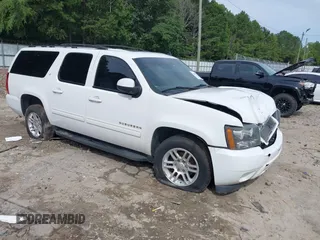 2014 Chevrolet Suburban LT with VIN 1GNSCJE08ER185472, listed as a IAAI auction lot 39849223 with 198,853 mi miles. Bid and sale history available at carsss.com. Image 1.