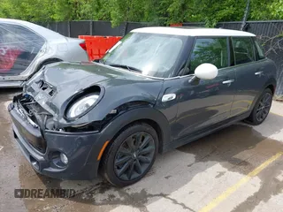 2019 MINI Hardtop 4 Door Cooper S z VIN WMWXU3C54K2H86856, wystawiony jako IAAI lot #42201474 z przebiegiem 56 610 mil mil oraz . Historia ofert i sprzedaży dostępna na DreamBid. Obrazek 17.