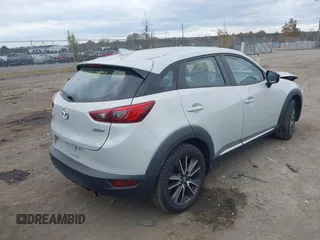 2016 Mazda CX-3 Grand Touring with VIN JM1DKBD78G0126342, listed as a IAAI auction lot 40787762 with 48,530 mi miles. Bid and sale history available at carsss.com. Image 4.