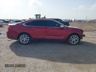 2014 Chevrolet Impala LTZ with VIN 1G1145SL0EU169876, listed as a IAAI auction lot 41696439 with 121,453 mi miles and . Bid and sale history available at DreamBid. Image 14.