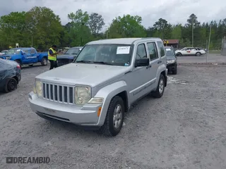 2011 Jeep Liberty Sport with VIN 1J4PP2GK6BW524454, listed as a IAAI auction lot 41985671 with 108,837 mi miles. Bid and sale history available at carsss.com. Image 2.