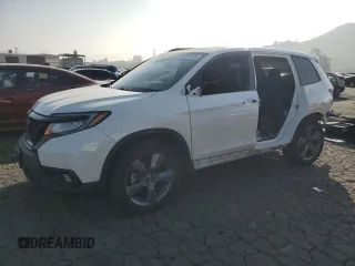 2019 Honda Passport Touring z VIN 5FNYF7H92KB006951, wystawiony jako Copart lot #82861534 z przebiegiem 132 484 mil mil oraz Szkody całkowita. Historia ofert i sprzedaży dostępna na DreamBid. Obrazek 1.