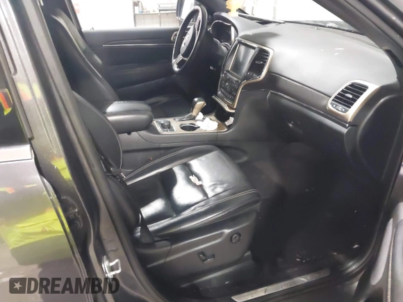 2016 Jeep Grand Cherokee Limited 75th Anniversary with VIN 1C4RJFBG3GC311089, listed as a IAAI auction lot 41953517 with 127,720 mi miles and . Bid and sale history available at DreamBid. Image 5.