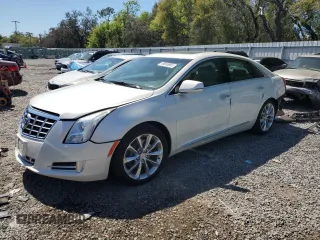 2014 Cadillac XTS Luxury z VIN 2G61N5S34E9246527, wystawiony jako Copart lot #48665065 z przebiegiem 64 450 mil mil oraz Szkoda całkowita • Salvage title. Historia ofert i sprzedaży dostępna na DreamBid. Obrazek 1.