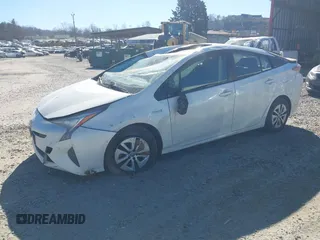 2018 Toyota Prius Two with VIN JTDKARFU2J3054890, listed as a IAAI auction lot 41639655 with 144,967 mi miles. Bid and sale history available at carsss.com. Image 2.