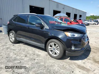 2020 Ford Edge SEL с VIN 2FMPK3J93LBA57329, выставлен на аукционе Copart как лот 56996185 с пробегом 120 631 миль миль и На запчасти • Non repairable. История ставок и продаж доступна на DreamBid. Изображение 4.
