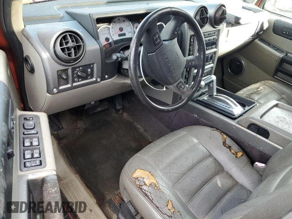 2003 Hummer H2 with VIN 5GRGN23U73H141713, listed as a Copart auction lot 84285624 with 152,719 mi miles and Non Repairable. Bid and sale history available at carsss.com. Image 8.
