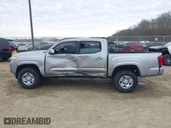 2018 Toyota Tacoma SR with VIN 3TMCZ5AN4JM130307, listed as a IAAI auction lot 41541477 with 74,369 mi miles and . Bid and sale history available at DreamBid. Image 15.