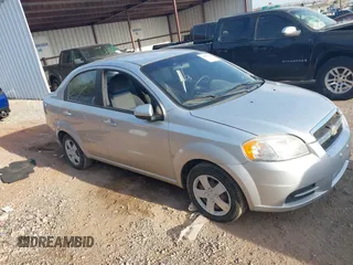 2009 Chevrolet Aveo 1LT z VIN KL1TD56E49B372791, wystawiony jako IAAI lot #41890124 z przebiegiem 118 648 mil mil oraz . Historia ofert i sprzedaży dostępna na DreamBid. Obrazek 13.