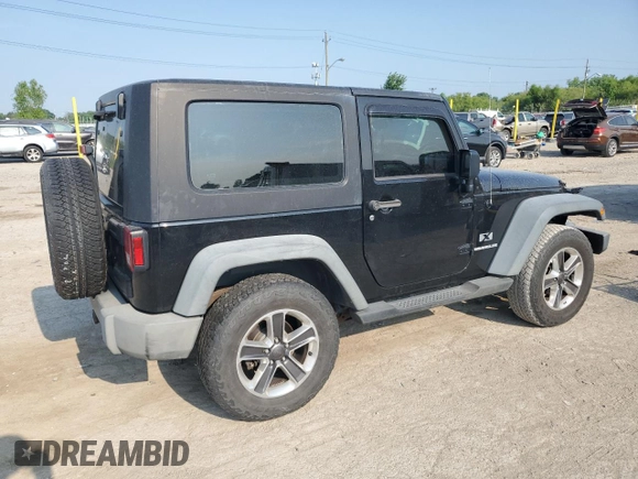 2009 Jeep Wrangler X with VIN 1J4FA24159L772540, listed as a Copart auction lot 62183815 with 179,628 mi miles and Salvage title. Bid and sale history available at DreamBid. Image 3.