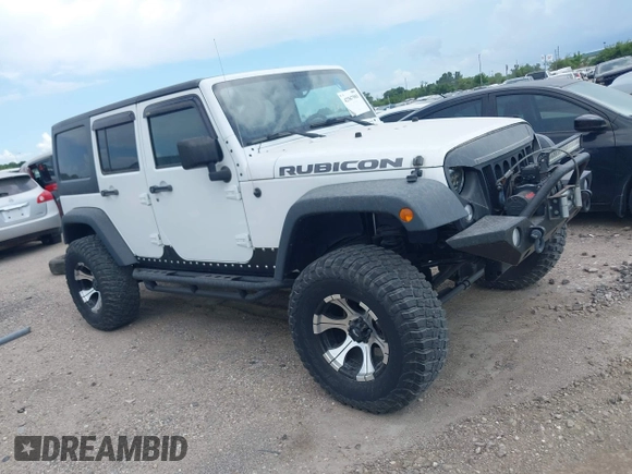 2011 Jeep Wrangler Unlimited Rubicon with VIN 1J4BA6H10BL536027, listed as a IAAI auction lot 42567901 with 164,487 mi miles and . Bid and sale history available at DreamBid. Image 1.