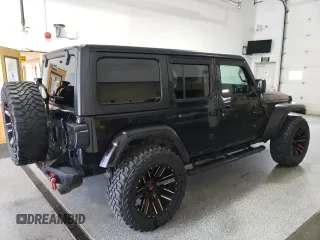 2020 Jeep Wrangler Unlimited Sahara z VIN 1C4HJXEN8LW118599, wystawiony jako Copart lot #60687535 z przebiegiem 74 824 mil mil oraz Czysty tytuł • Clean title. Historia ofert i sprzedaży dostępna na DreamBid. Obrazek 3.