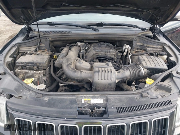 2014 Jeep Grand Cherokee Limited z VIN 1C4RJFBG0EC297746, wystawiony jako IAAI lot #41956879 z przebiegiem 212 106 mil mil oraz . Historia ofert i sprzedaży dostępna na DreamBid. Obrazek 10.