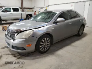 2011 Suzuki Kizashi SE z VIN JS2RE9A3XB6110775, wystawiony jako Copart lot #79081194 z przebiegiem 278 774 mil mil oraz Szkody całkowita. Historia ofert i sprzedaży dostępna na DreamBid. Obrazek 1.