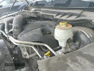 2014 Ram 1500 Laramie with VIN 1C6RR6NT0ES122640, listed as a IAAI auction lot 42638561 with 129,878 mi miles and . Bid and sale history available at DreamBid. Image 19.