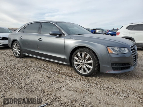 2017 Audi A8 with VIN WAU44AFD3HN002052, listed as a Copart auction lot 41834475 with 111,666 mi miles and Salvage title. Bid and sale history available at DreamBid. Image 4.
