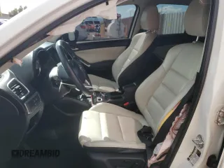 2016 Mazda CX-5 Grand Touring with VIN JM3KE4DY9G0662369, listed as a Copart auction lot 53169895 with 160,784 mi miles and Salvage Title. Bid and sale history available at carsss.com. Image 7.