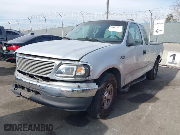 2002 Ford F-150 XL with VIN 1FTRX17262NB99755, listed as a IAAI auction lot 41181246 with 1 mi miles. Bid and sale history available at carsss.com. Image 2.