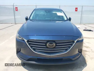 2018 Mazda CX-9 Touring with VIN JM3TCBCY3J0220372, listed as a IAAI auction lot 42405192 with 104,556 mi miles and . Bid and sale history available at DreamBid. Image 12.