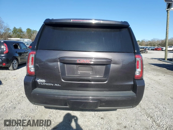 2015 GMC Yukon XL SLT with VIN 1GKS1HKC3FR188825, listed as a Copart auction lot 88904935 with 201,178 mi miles and Salvage Title. Bid and sale history available at carsss.com. Image 6.