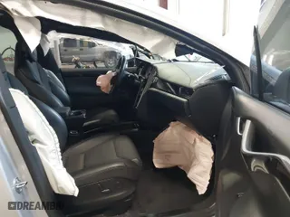 2018 Tesla Model X 75D with VIN 5YJXCDE28JF120932, listed as a IAAI auction lot 41899059 with 57,568 mi miles. Bid and sale history available at carsss.com. Image 5.