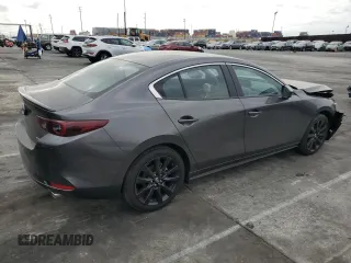 2025 Mazda 3 S Select Sport with VIN JM1BPABM5S1767690, listed as a Copart auction lot 52829045 with 1,093 mi miles and Salvage Title. Bid and sale history available at DreamBid. Image 3.