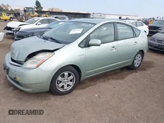 2006 Toyota Prius z VIN JTDKB20U963131145, wystawiony jako IAAI lot #41857847 z przebiegiem 113 251 mil mil oraz . Historia ofert i sprzedaży dostępna na DreamBid. Obrazek 2.