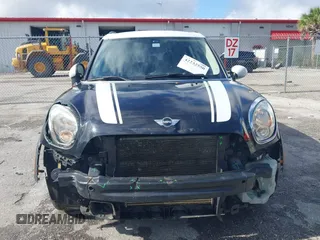 2013 MINI Countryman S z VIN WMWZC3C5XDWP24270, wystawiony jako IAAI lot #42232550 z przebiegiem 95 512 mil mil oraz . Historia ofert i sprzedaży dostępna na DreamBid. Obrazek 12.