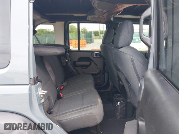 2024 Jeep Wrangler Sport S with VIN 1C4PJXDG4RW353640, listed as a IAAI auction lot 42152688 with Not provided miles and . Bid and sale history available at DreamBid. Image 8.