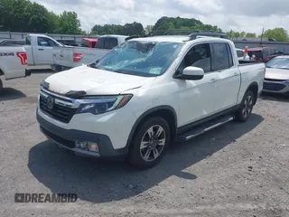 2019 Honda Ridgeline RTL-E with VIN 5FPYK3F77KB021667, listed as a IAAI auction lot 42115019 with 87,221 mi miles and . Bid and sale history available at DreamBid. Image 22.