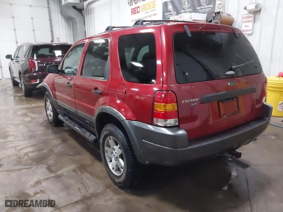 2003 Ford Escape XLT Popular 2 with VIN 1FMCU93173KA52806, listed as a IAAI auction lot 41696250 with 138,338 mi miles. Bid and sale history available at carsss.com. Image 3.