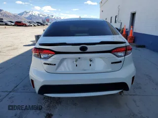 2021 Toyota Corolla Hybrid LE with VIN JTDEAMDE2MJ030570, listed as a Copart auction lot 50530625 with 80,249 mi miles and Salvage Title. Bid and sale history available at carsss.com. Image 6.
