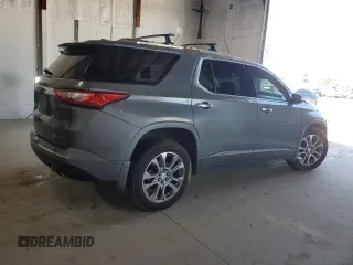 2018 Chevrolet Traverse Premier z VIN 1GNEVJKW9JJ261483, wystawiony jako Copart lot #50180235 z przebiegiem 97 537 mil mil oraz Szkoda całkowita • Salvage title. Historia ofert i sprzedaży dostępna na DreamBid. Obrazek 3.