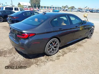 2023 BMW 5 Series 530i with VIN WBA53BH08PCL21884, listed as a IAAI auction lot 41991227 with 30,171 mi miles and . Bid and sale history available at DreamBid. Image 4.