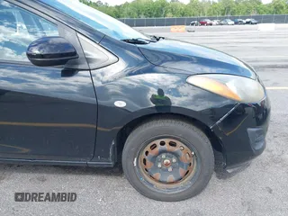 2012 Mazda 2 Sport with VIN JM1DE1KY9C0150026, listed as a IAAI auction lot 42196612 with 166,806 mi miles and . Bid and sale history available at DreamBid. Image 6.