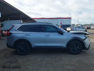 2023 Honda CR-V Hybrid Sport Touring with VIN 7FARS6H95PE004133, listed as a IAAI auction lot 41241806 with 82,427 mi miles. Bid and sale history available at carsss.com. Image 13.