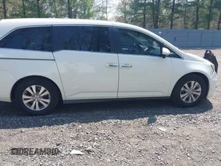 2015 Honda Odyssey EX-L with VIN 5FNRL5H64FB069742, listed as a IAAI auction lot 42101807 with 152,611 mi miles and . Bid and sale history available at DreamBid. Image 13.
