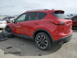 2016 Mazda CX-5 Grand Touring with VIN JM3KE4DY0G0820954, listed as a Copart auction lot 48027785 with 152,448 mi miles and Salvage Title. Bid and sale history available at carsss.com. Image 2.