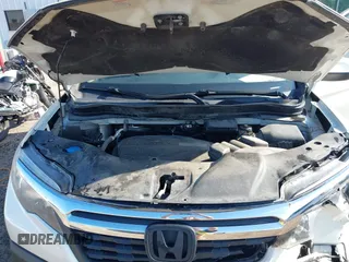2017 Honda Ridgeline RTL-T z VIN 5FPYK3F69HB038048, wystawiony jako IAAI lot #42583177 z przebiegiem 183 564 mil mil oraz . Historia ofert i sprzedaży dostępna na DreamBid. Obrazek 10.