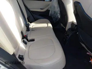 2018 BMW X1 xDrive28i with VIN WBXHT3C34J5L29714, listed as a IAAI auction lot 41825126 with 89,970 mi miles. Bid and sale history available at carsss.com. Image 8.