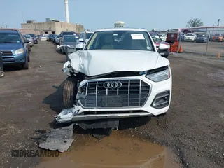 2021 Audi Q5 Premium Plus z VIN WA1BAAFYXM2050028, wystawiony jako IAAI lot #42479898 z przebiegiem 39 015 mil mil oraz . Historia ofert i sprzedaży dostępna na DreamBid. Obrazek 12.